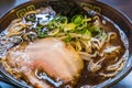 Kuro tonkotsu ramen with chashu pork and bean sprout.