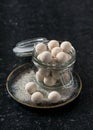 Kurt balls made from goat milk, salt and spices in glass jar.