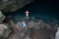 Kusadasi, Aydin, Turkey - August 22, 2021: Tourist couples enjoy zeus cave and take photos