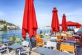 Kusadasi, Turkey, 05/19/2019: Cafe with colorful chairs in the port on the beach. Beautiful view