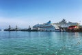 Kusadasi, Turkey, 05/19/2019: Cruise liners in the city port. Beautiful view from the sea on a sunny day. Space for text. A