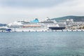 Kusadasi, Turkey, 05/19/2019: Large beautiful cruise ships stand in the port. Turquoise sea and clear blue sky on a sunny day.