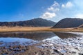 Kusasenri (kusasenri-ga-hama) prairie in January, Mt. Eboshi in the background Royalty Free Stock Photo