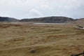 Kusasenri grass field and mountain with active volcanoes travel location in Japan