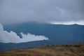 Kusasenri grass field and mountain with active volcanoes travel location in Japan