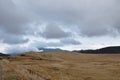 Kusasenri grass field and mountain with active volcanoes travel location in Japan