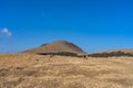 Kusasenri (kusasenri-ga-hama) prairie in January, Mt. Kishima in the background Royalty Free Stock Photo