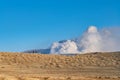 Kusasenri prairie in January, fuming Mt. Naka in the background Royalty Free Stock Photo