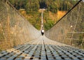 Suspension bridge over the Kali Gandaki river between Kushma and Royalty Free Stock Photo