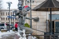 Famous sculpture of young man with hats on White Bridge over Rioni river Royalty Free Stock Photo