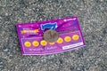 Georgian lotto lottery scratch card with 1 lari coin