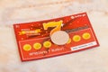 Georgian Lotto scratch card ticket and coin