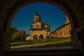 KUTAISI, GEORGIA: View of the old stone Bell Tower in the Orthodox monastery of Gelati on a sunny summer day. UNESCO. Royalty Free Stock Photo