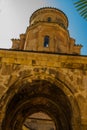 KUTAISI, GEORGIA: View of the old stone Bell Tower in the Orthodox monastery of Gelati on a sunny summer day. UNESCO. Royalty Free Stock Photo