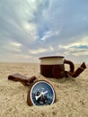 kuwait desert - lost with a cup of coffee and a compass