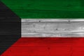 Kuwait flag painted on old wood plank Royalty Free Stock Photo