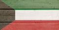 Kuwait flag painted on wood plank background. Wooden texture flag of Kuwait Royalty Free Stock Photo