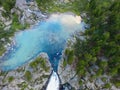 Kuyguk lake and waterfall in Altai mountains. Russian landscape aerial view