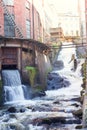 Kvarnbyn Waterfall in old industrial work area in Molndal, Gothenburg, Sweden Royalty Free Stock Photo