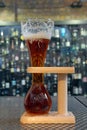 Kwak beer served in its uniquely shaped glass with stand Royalty Free Stock Photo