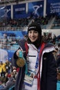 Olympic champion in Ladies` Moguls Perrine Laffont of France posing with gold medal