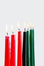 Kwanzaa candles on light background. Close up. Royalty Free Stock Photo