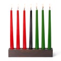 Kwanzaa festival concept with seven candles red, black and green in candlestick is isolated on white