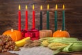 Kwanzaa festival concept with seven candles red, black and green Royalty Free Stock Photo