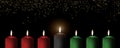 Kwanzaa holiday background with candle light of seven candle sticks in black, green, red symbolising 7 principles of African Royalty Free Stock Photo