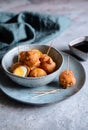 Kwek Kwek - deep fried quail eggs coated with batter served with soya sauce and vinegar dip