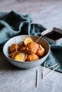 Kwek Kwek - deep fried quail eggs coated with batter served with soya sauce and vinegar dip