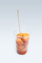 Kwek Ã¢â¬â Kwek / Tokneneng Ã¢â¬â a Filipino tempura-like street food in plastic cup. White isolated background Royalty Free Stock Photo