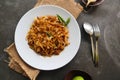 Kwetiau goreng is Chinese Indonesian stir fried flat rice noodle dish made from kwetiau, stir fried in cooking oil with garlic,. Royalty Free Stock Photo