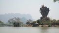 Kyaut Ka Latt Pagoda in a dry mountain landscape near Hpa-An, Burma, Myanmar.