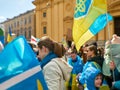 Kyiv - April, 2022. Protesters marching with posters on prostest against Russian agression Royalty Free Stock Photo