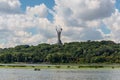 Kyiv cityscape with the Motherland Monument, Ukraine, view from Dnieper river