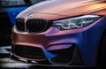 BMW M3 F80 vehicle wrapped in purple matte chameleon vinyl wrap,equipped with custom wide body kit with carbon