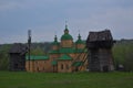 Orthodox Church and two traditional Ukrainian windmills, Royalty Free Stock Photo