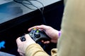 Kyiv, Ukraine - April 12, 2019: Close-up of gamepad Xbox in hand Royalty Free Stock Photo