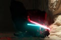 Cosplayers portray lightsaber combat between characters enemies Rey Skywalker and Kylo Ren from the Star Wars universe among Royalty Free Stock Photo