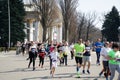 Kyiv - Ukraine, April 07, 2019: Crowd of People and Athletes Runners Run along the Road in the City