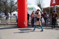 Kyiv - Ukraine, April 07, 2019: Crowd of People and Athletes Runners Run along the Road in the City