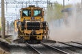 Kyiv Ukraine - April 27 2020: A huge dust cloud in the center of a big city during the operation of the auxiliary railway machine