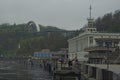 Landscape view of high water in Kyiv. Pathway under the water along the Dnieper River embankment.