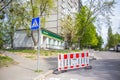 Kyiv, Ukraine 20 April 2024 a photo of road repair on asphalt in the city barricade signs