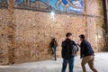 Visitors to the River Station are photographed against the background of famous frescoes and mosaic panels. Kyiv Ukraine