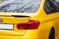 Kyiv. Ukraine. April 2024. Yellow BMW car close-up. LED tail light bulb of a car. the rear light Royalty Free Stock Photo