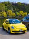 Kyiv, Ukraine, April 2019: Yellow Volkswagen Beetle in the city park, Kyiv, Ukraine