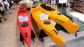 Kyiv, Ukraine - August 16, 2020: Collection of vibrant colorful plastic recreational canoe and kayaks Kolibri One-GO at store at