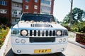 Kyiv, Ukraine - August 31: Elegance white wedding limousine Hummer H2 on wedding day. Royalty Free Stock Photo